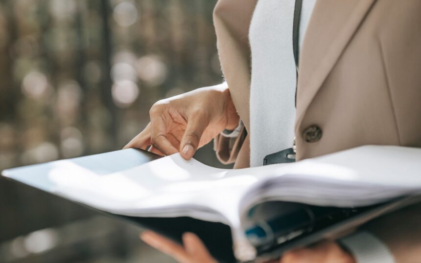 Woman looking through a file